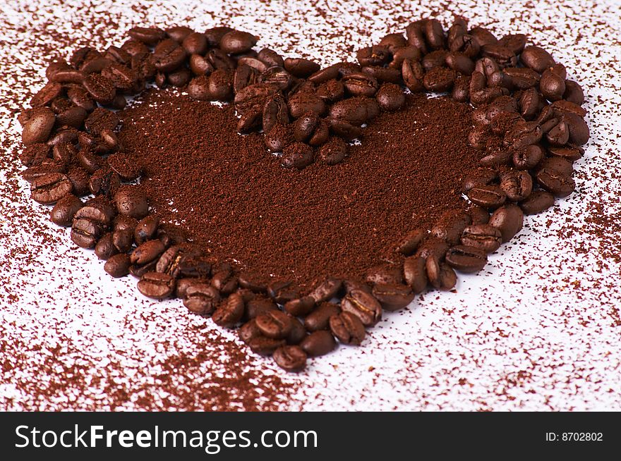 A heart out of fresh and tasty coffee beans. A heart out of fresh and tasty coffee beans