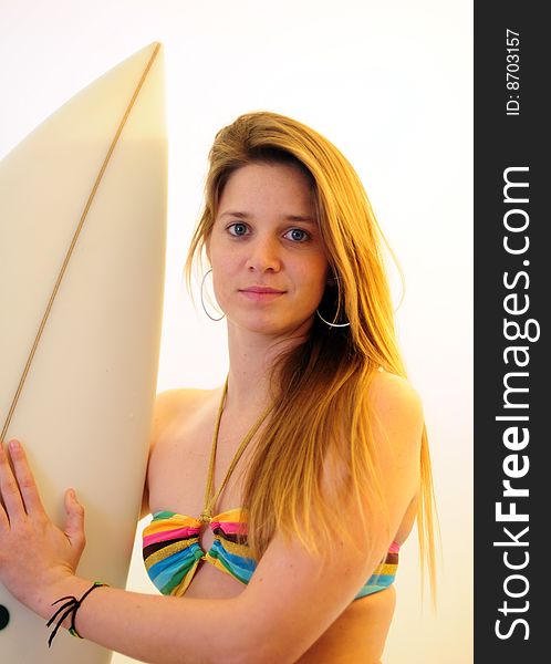 Attractive red head girl with surfboard. Attractive red head girl with surfboard