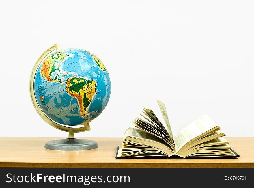 Books on a table on a white background. Books on a table on a white background