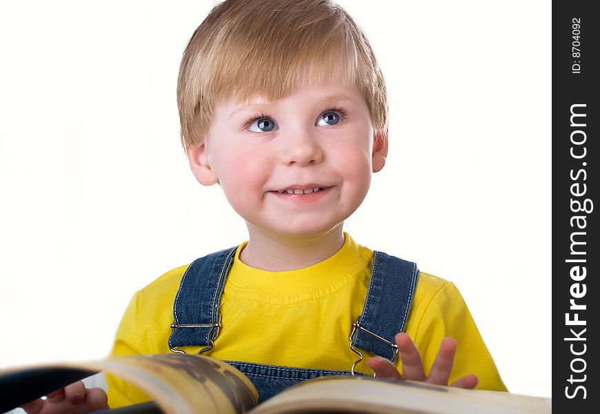 The child with books on the white background
