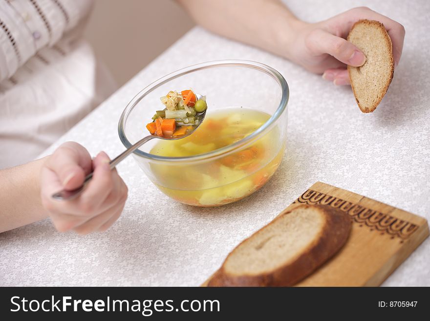 A photo of plate of with soup