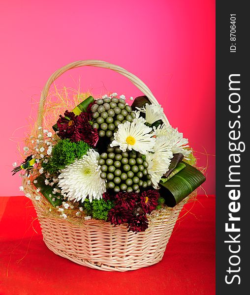 Bunch of flowers in wicker basket