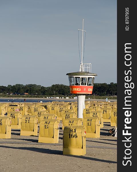 Some beach-baskets at the beach. Some beach-baskets at the beach