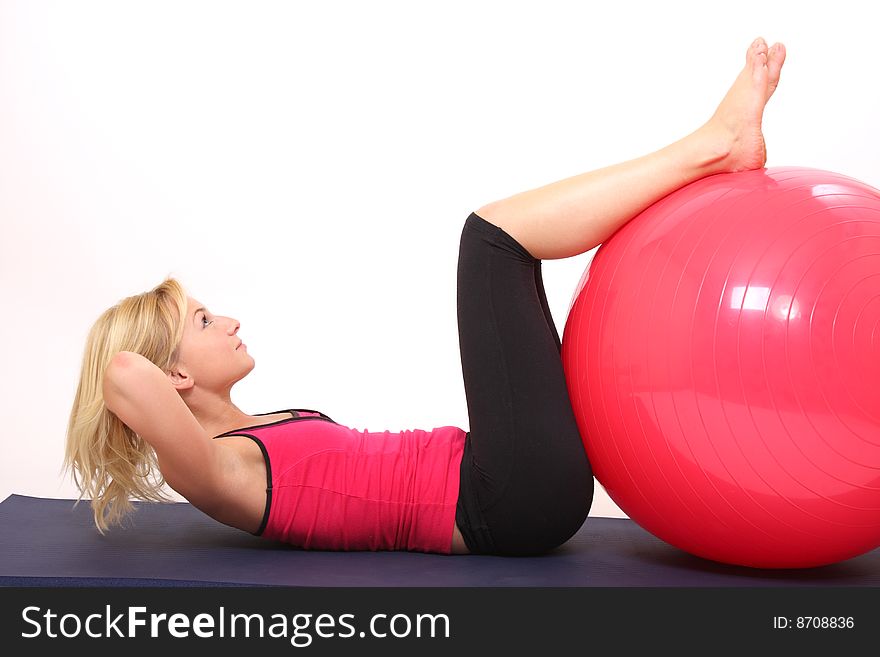 Young woman doing exercise with fit-ball. Young woman doing exercise with fit-ball