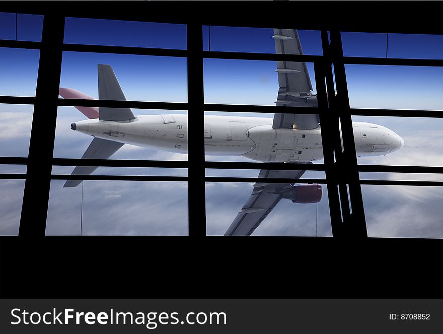 The airplane on the blue sky background. The airplane on the blue sky background.