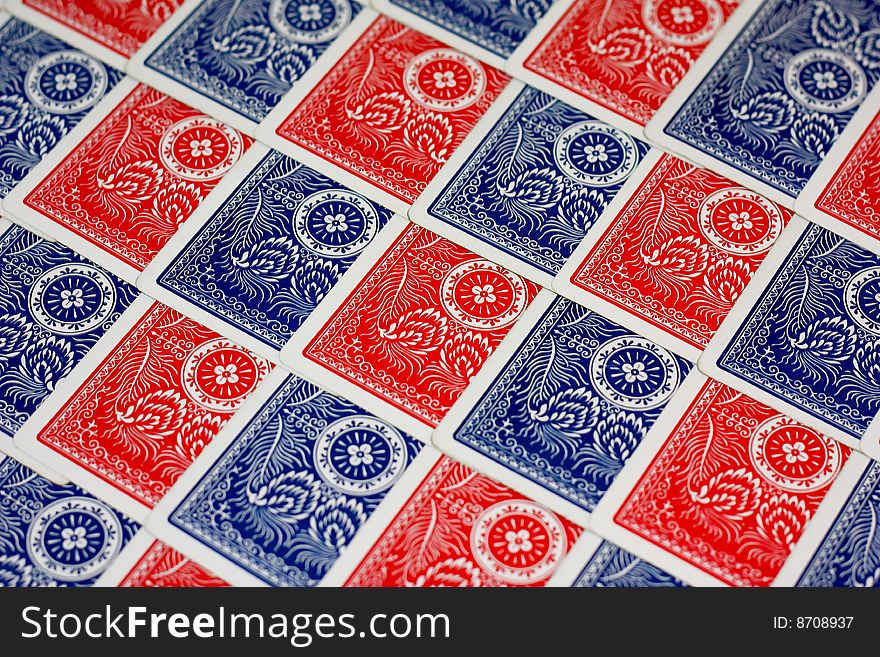 Red and blue playing cards arranged in a orderly manner