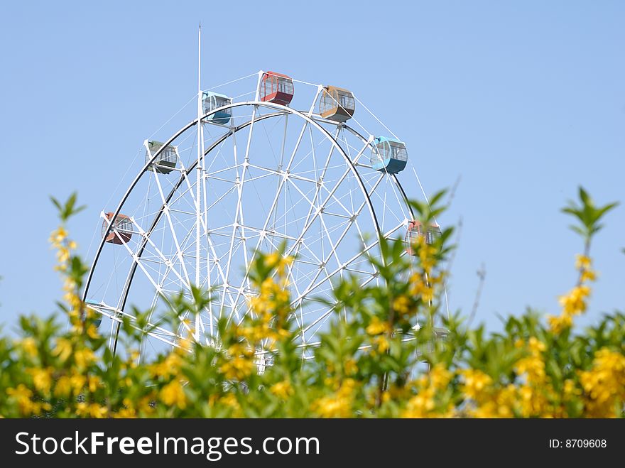 Big wheel with blue sky background