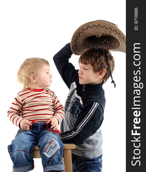 Two little boys (brothers) isolated on white background