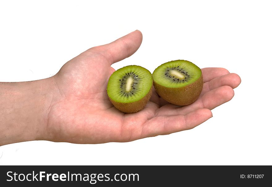 Sections Of Kiwi Fruit On Palm