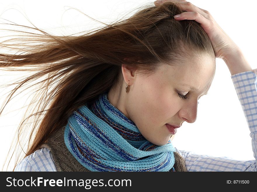 Young woman wrap up into scarf isolated on white background