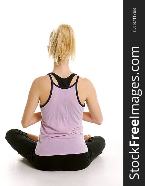 Blond Woman Doing Yoga sitting on a white background. Blond Woman Doing Yoga sitting on a white background