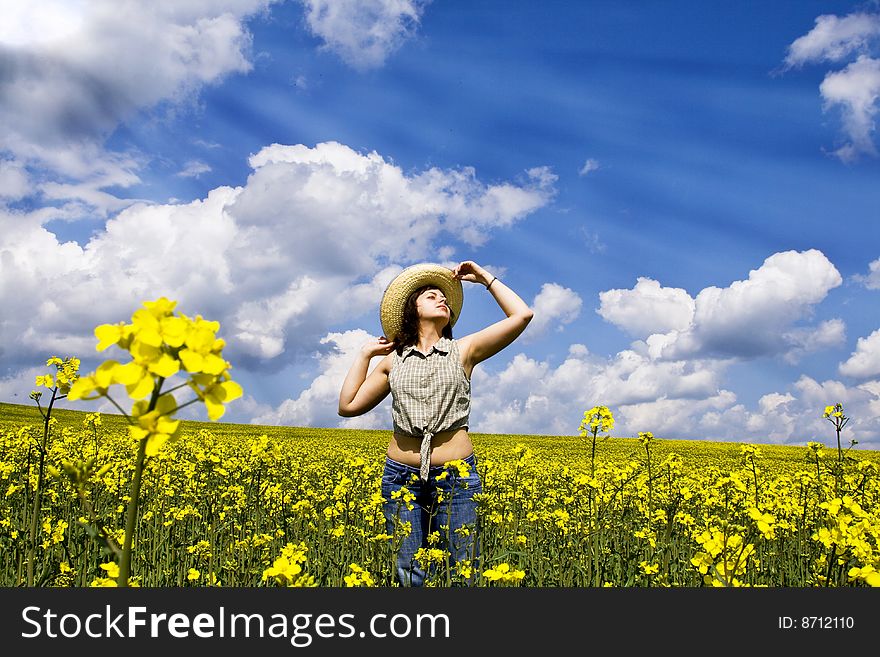 young woman enjoying spring in bright sunlight