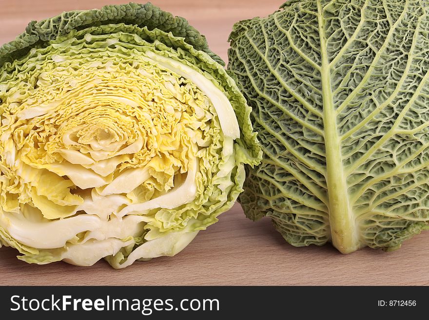 Halved large green cabbage closeup. Halved large green cabbage closeup