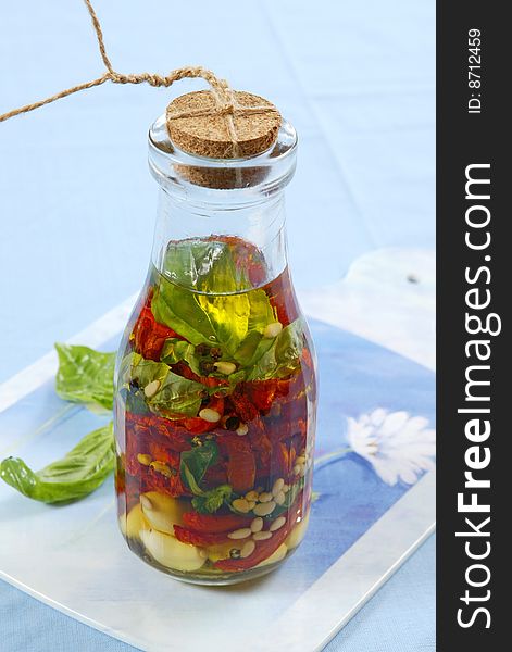 Marinated vegetables in glass bottle