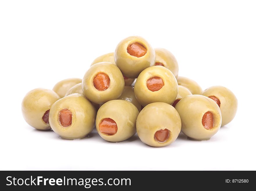 Pepper stuffed olives isolated over white background