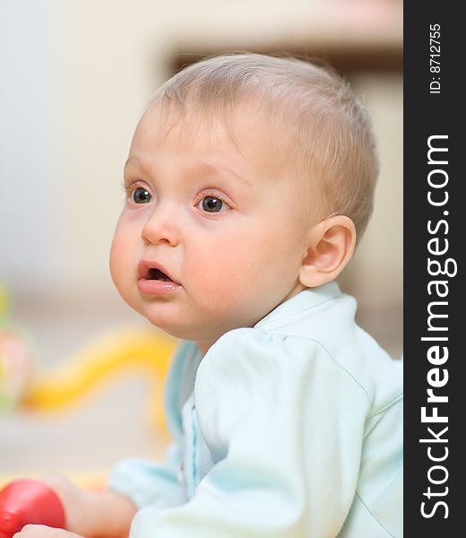 Interested adorable baby close-up - shallow DOF