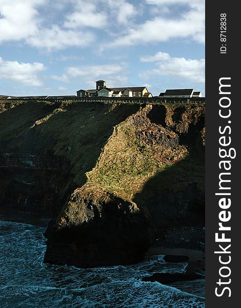 A convent on the edge of cliffs in ireland. A convent on the edge of cliffs in ireland