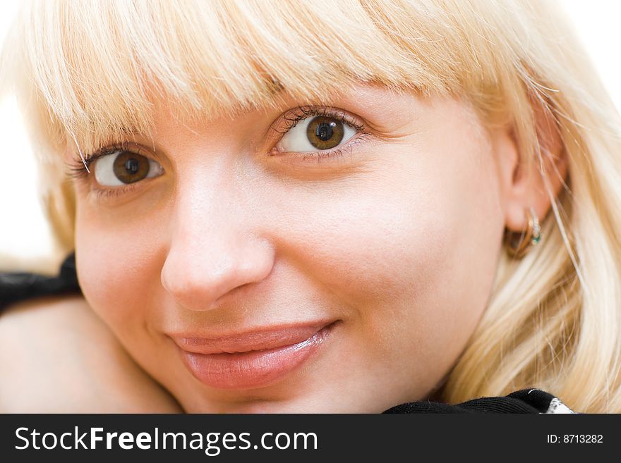 Pretty smiling blonde close-up photo. Pretty smiling blonde close-up photo