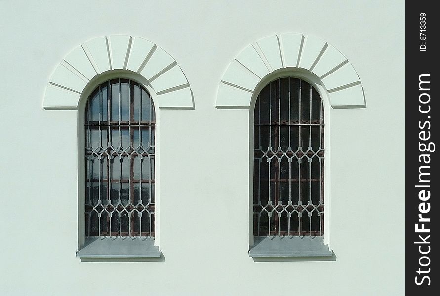 Pair of church windows on painted wall