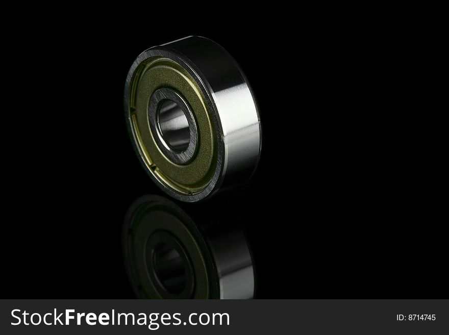 The ball bearing on a black background. The ball bearing on a black background