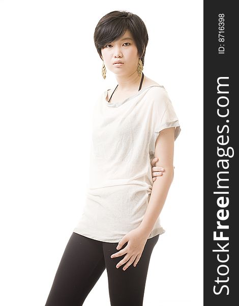 Female asian model in fashionable clothing on white. Female asian model in fashionable clothing on white