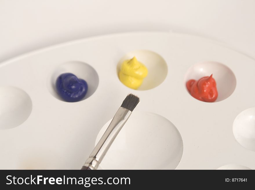 Artists palette with multiple colors white background. Artists palette with multiple colors white background