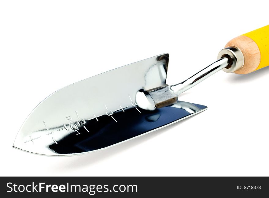 Trowel of silver color isolated over white