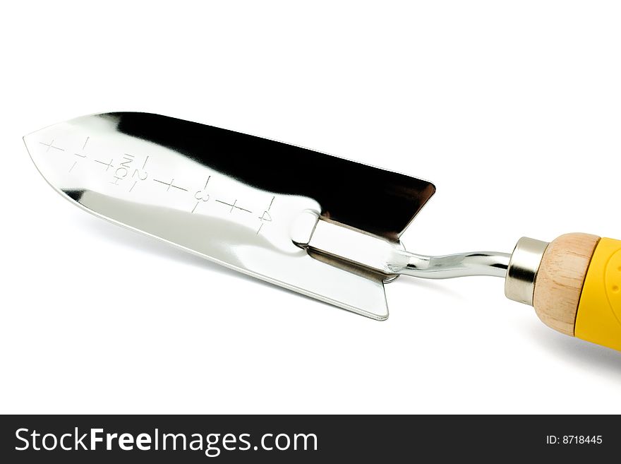 Close-up of a trowel isolated over white