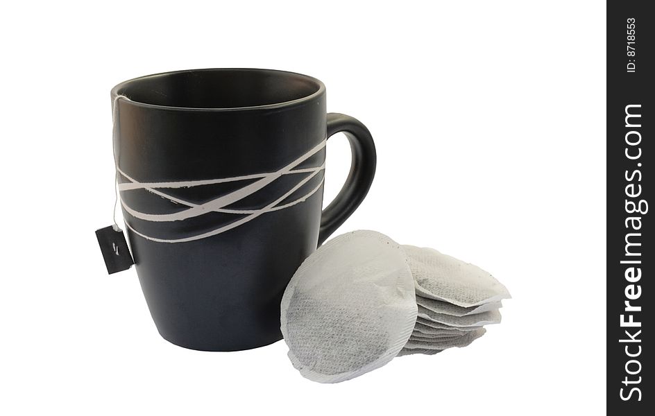 Image of a mug and tea bags isolated on a white background. Image of a mug and tea bags isolated on a white background
