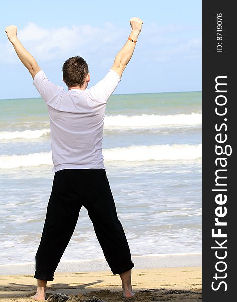 Man doing sport on the beach