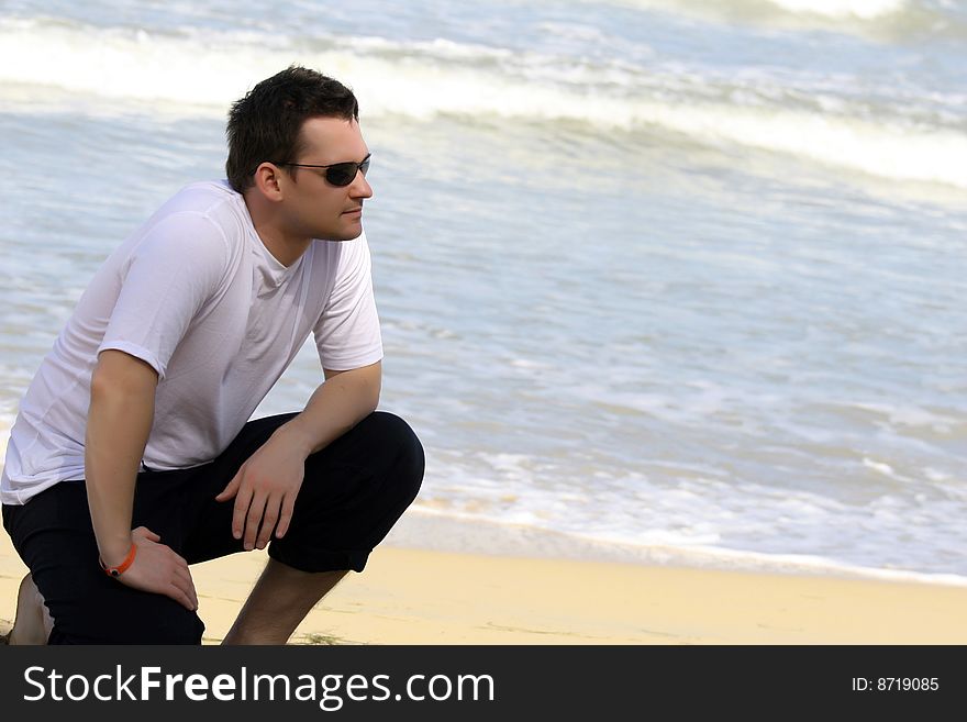 Man posing on the caribbean beach. Man posing on the caribbean beach