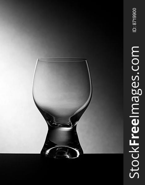 Empty glass with dramatic lighting effect