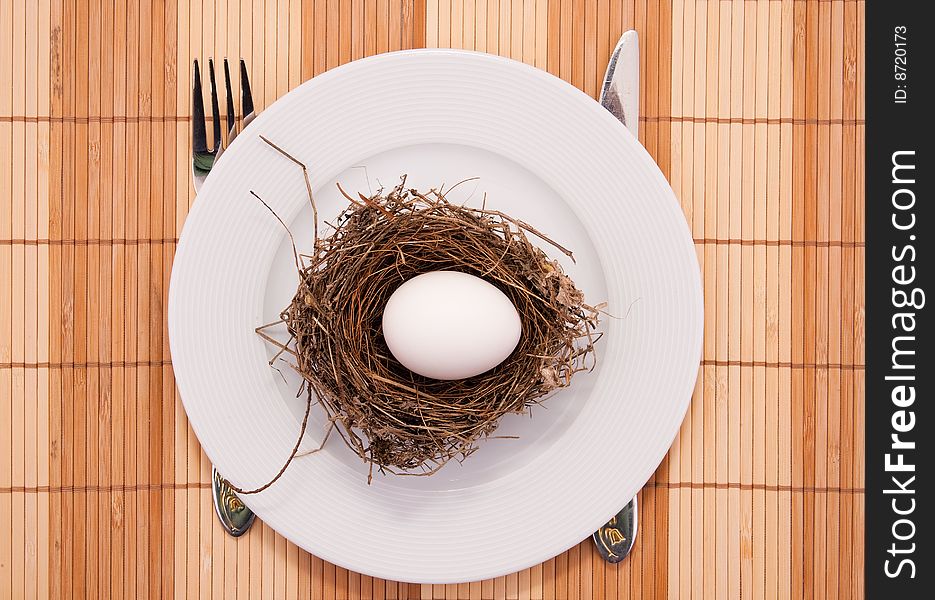 Egg In A Nest Served On A Plate