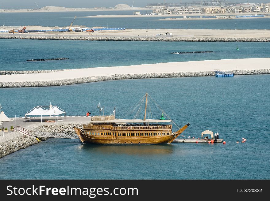 Two of the famous icons of Dubai city are the Dhow and the numerous construction sites that are seen everywhere. Two of the famous icons of Dubai city are the Dhow and the numerous construction sites that are seen everywhere...