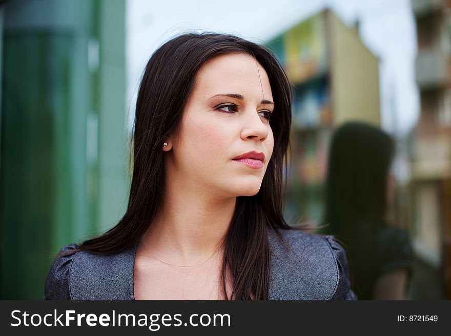 Portrait of a beautiful young businesswoman in the city. Portrait of a beautiful young businesswoman in the city