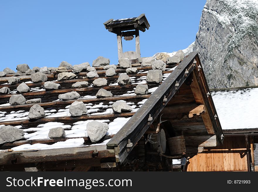 A roof of a house in an alpine village. A roof of a house in an alpine village.
