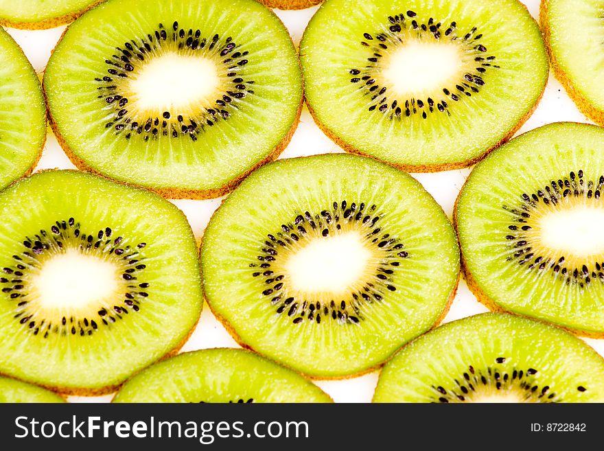 The kiwi slices on white closeup
