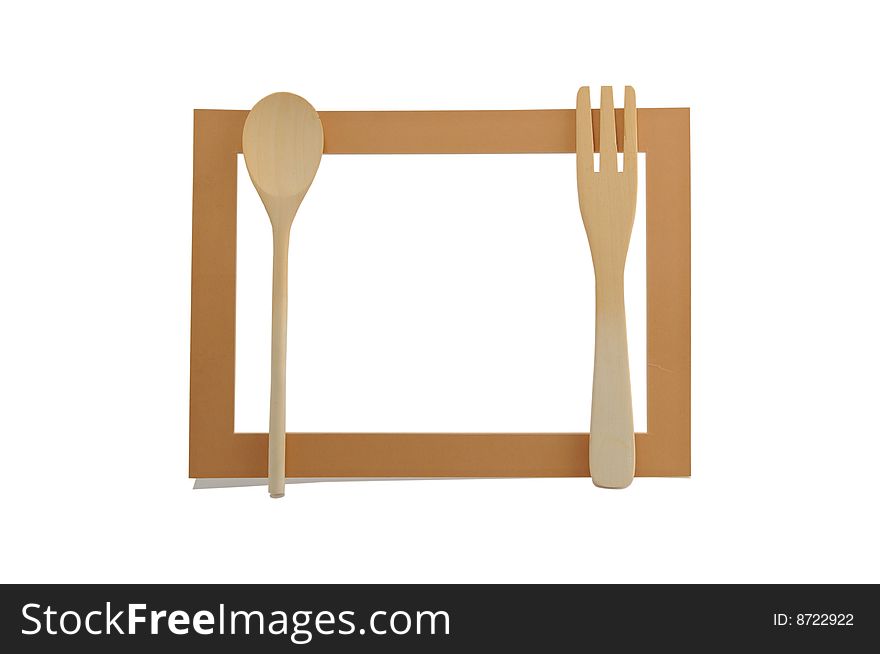 Three objects: the wooden spoon, a wooden plug and a framework from a cardboard on a white background.