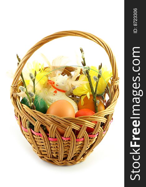 Easter basket, with  colored eggs, over white background. Easter basket, with  colored eggs, over white background