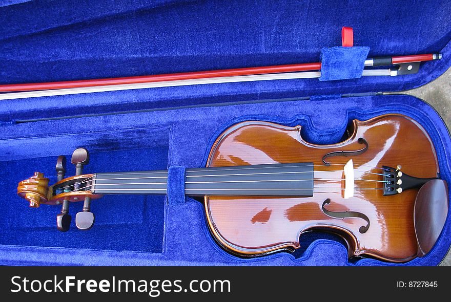 Violin in its case with the bow