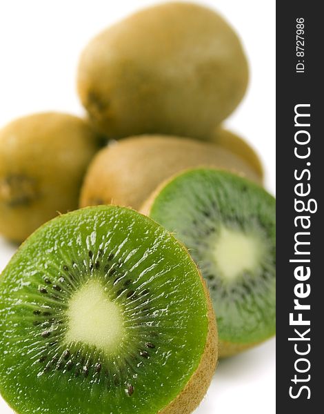 Some kiwi closeup on white background