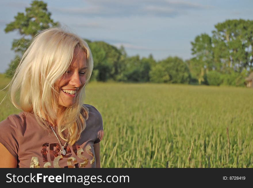 Portrait of the smiling Russian blonde on the nature. Portrait of the smiling Russian blonde on the nature