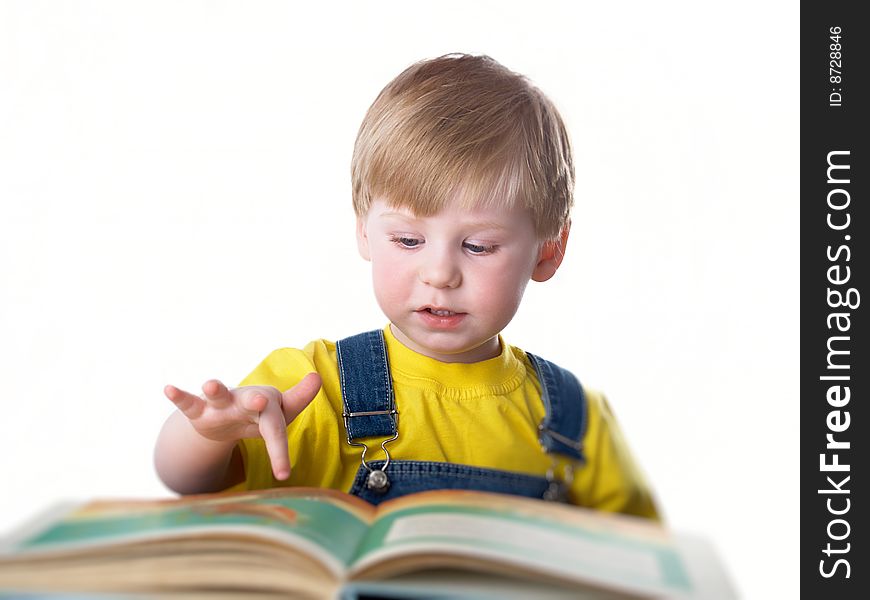 The child with books on the white background