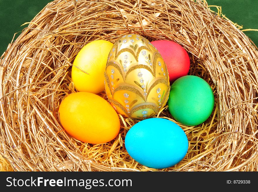 Easter eggs in the golden nest