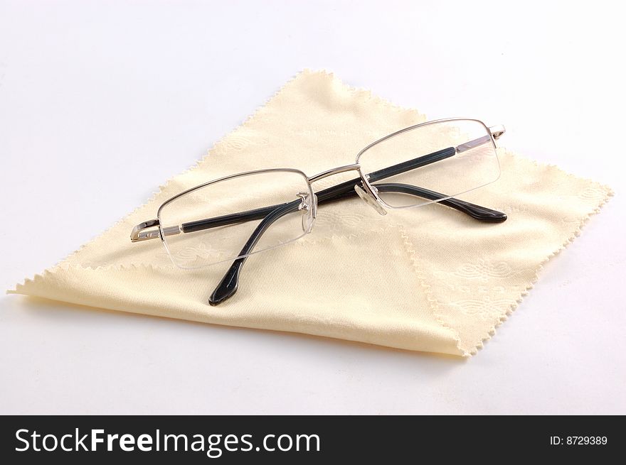 Glasses on a yellow serviette