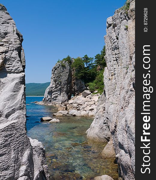 A landscape on roky seacoast of Japanese sea. A landscape on roky seacoast of Japanese sea.