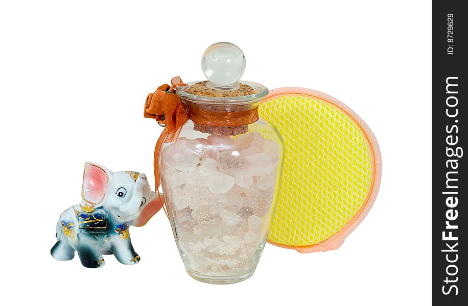 A close-up of the aromatic salt for bath, facecloth and toy china elephant. A close-up of the aromatic salt for bath, facecloth and toy china elephant.