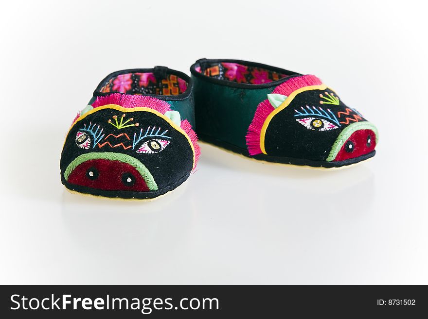 Chinese folk art hand,children's shoes. Chinese folk art hand,children's shoes