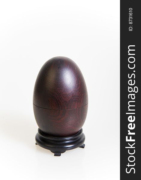 Empty wooden egg on white background,(jewelry box)