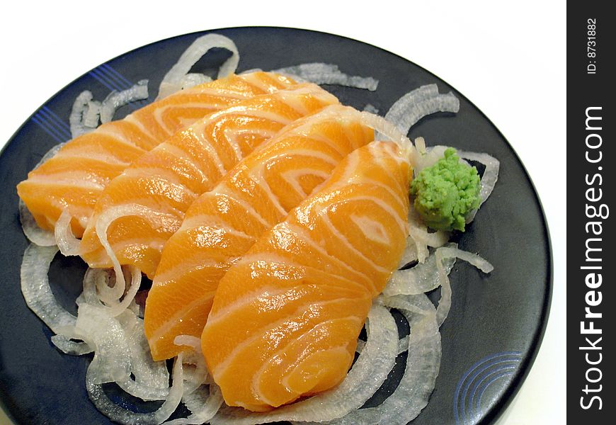 Fresh salmon sashimi on dish